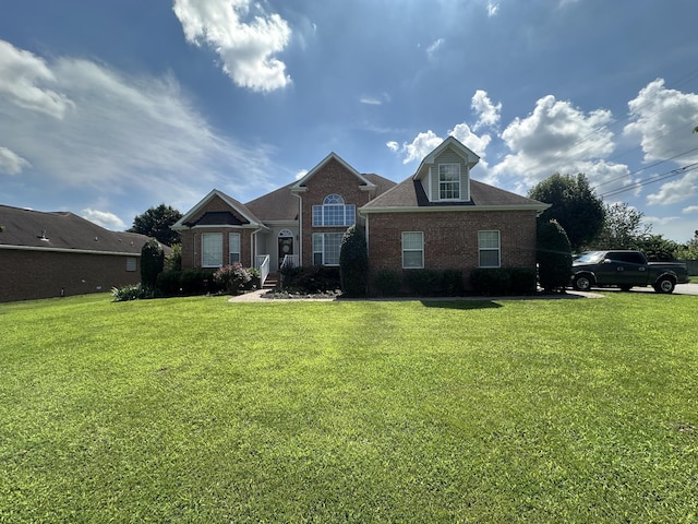1239 Wentworth Dr, Gallatin, TN 37066 - view of front of house featuring brick siding and a front lawn
