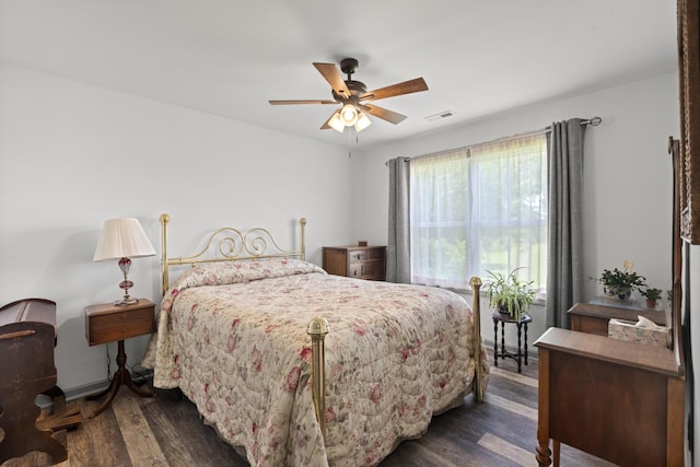 1072 Dugout Rd, Summertown, TN 38483 - bedroom with dark wood-style floors and ceiling fan
