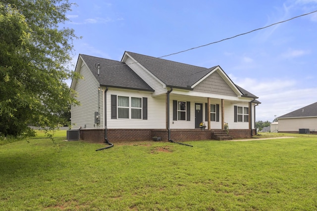 1072 Dugout Rd, Summertown, TN 38483 - view of front facade with covered porch, a front lawn, and roof with shingles