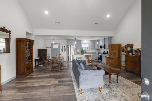 1072 Dugout Rd, Summertown, TN 38483 - living room with dark wood-type flooring, high vaulted ceiling, and recessed lighting