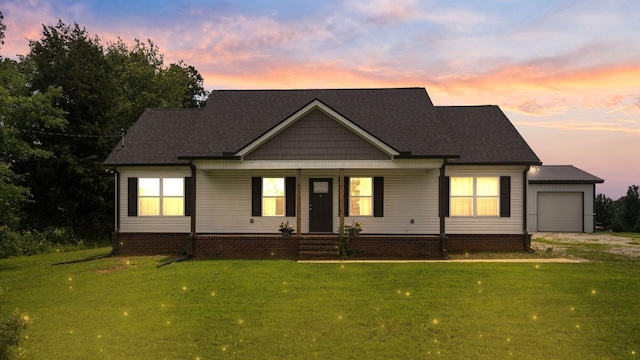 1072 Dugout Rd, Summertown, TN 38483 - view of front of property with an attached garage, a yard, covered porch, and driveway