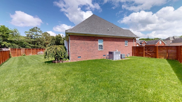 6300 Spera Pointe Xing, Hermitage, TN 37076 - back of house featuring roof with shingles, crawl space, a fenced backyard, and brick siding