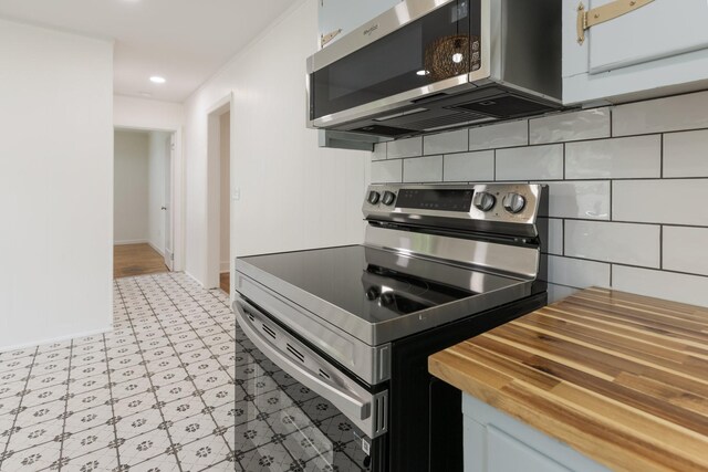 2108 Denham Ave, Columbia, TN 38401 - kitchen featuring stainless steel appliances, butcher block countertops, light floors, backsplash, and recessed lighting