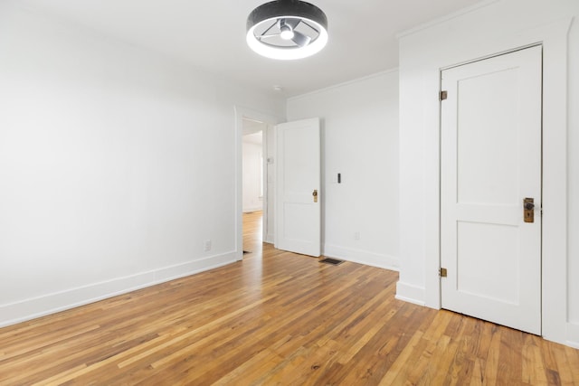 2108 Denham Ave, Columbia, TN 38401 - unfurnished bedroom featuring light wood finished floors and ornamental molding