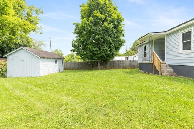 2108 Denham Ave, Columbia, TN 38401 - view of yard featuring a storage unit