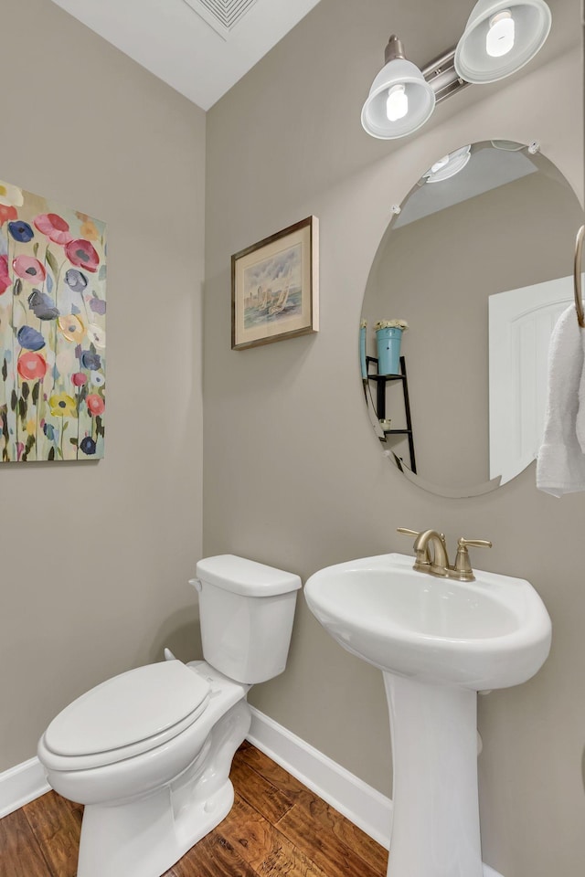 1060 Harvey Springs Dr, Spring Hill, TN 37174 - bathroom featuring toilet and wood finished floors