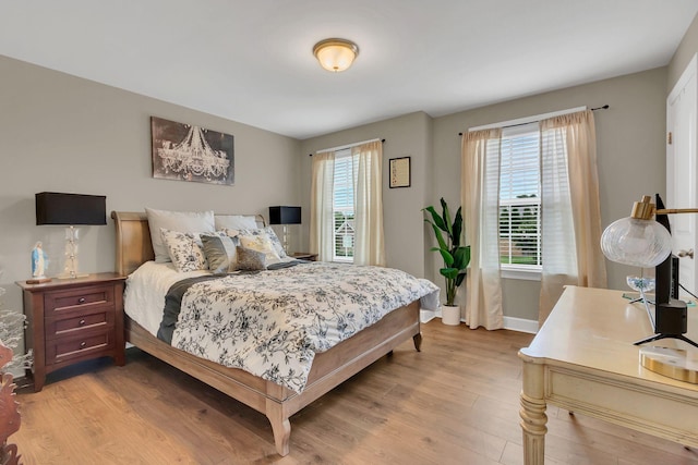 1060 Harvey Springs Dr, Spring Hill, TN 37174 - bedroom with light wood-style floors and baseboards