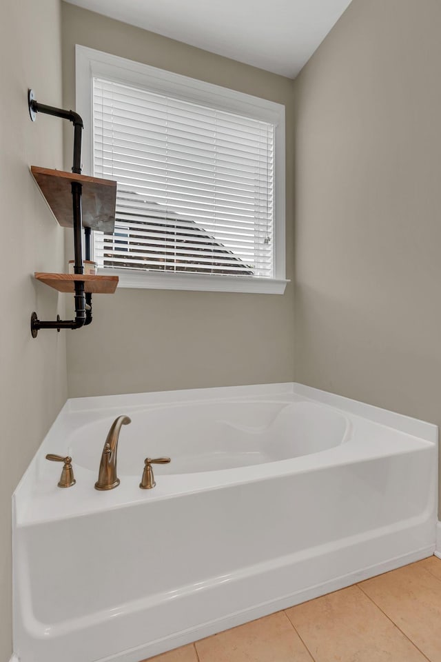 1060 Harvey Springs Dr, Spring Hill, TN 37174 - bathroom featuring a bath and tile patterned flooring