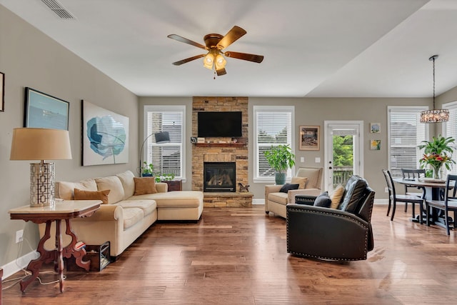1060 Harvey Springs Dr, Spring Hill, TN 37174 - living room featuring a ceiling fan, healthy amount of natural light, and wood finished floors