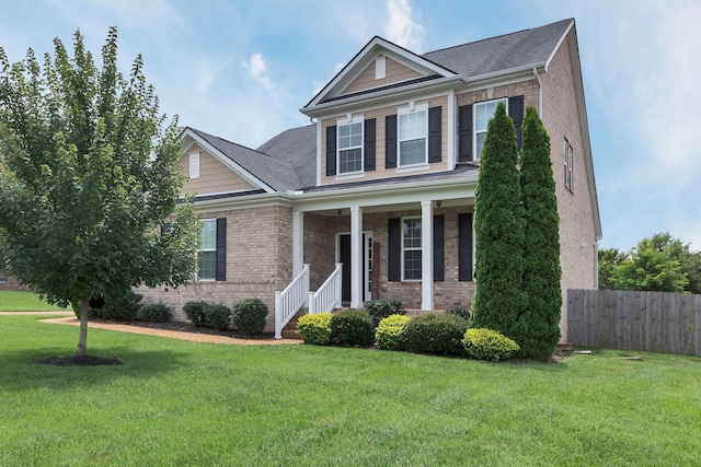 1060 Harvey Springs Dr, Spring Hill, TN 37174 - view of front of property with brick siding, a porch, and a shingled roof