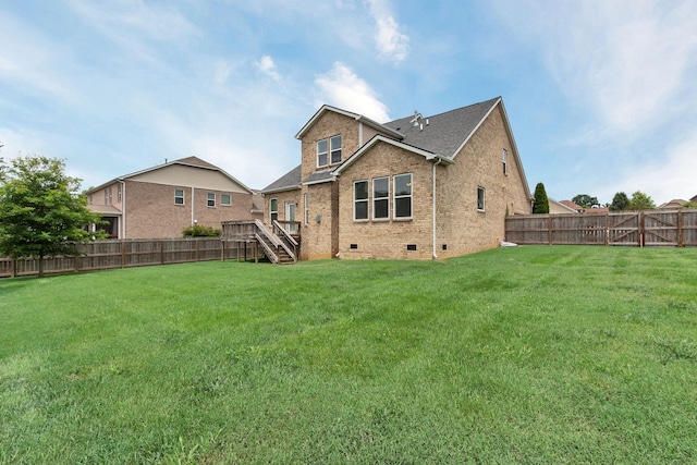 1060 Harvey Springs Dr, Spring Hill, TN 37174 - rear view of property featuring crawl space, brick siding, a fenced backyard, stairs, and a shingled roof
