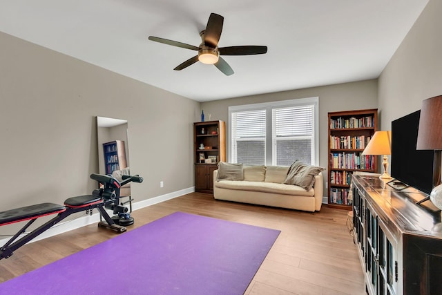 1060 Harvey Springs Dr, Spring Hill, TN 37174 - exercise room with light wood finished floors and a ceiling fan