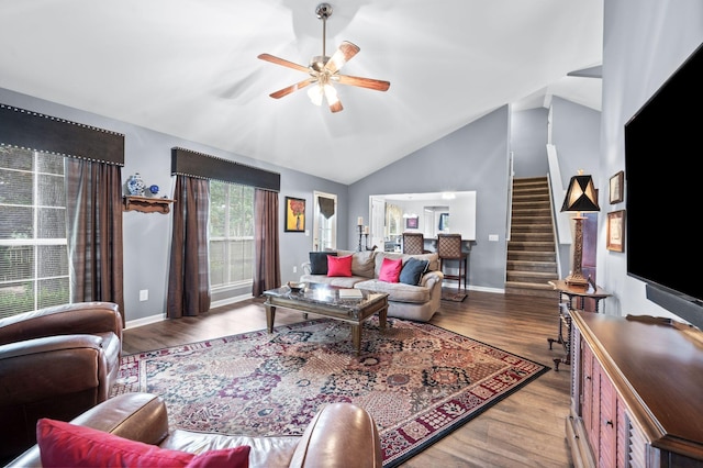 256 Granger View Cir, Franklin, TN 37064 - living room featuring stairway, ceiling fan, wood finished floors, and high vaulted ceiling