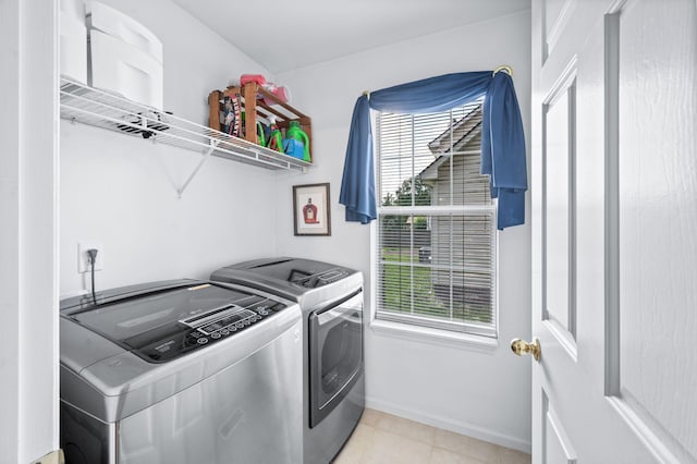 256 Granger View Cir, Franklin, TN 37064 - laundry area with washer and dryer and light tile patterned flooring
