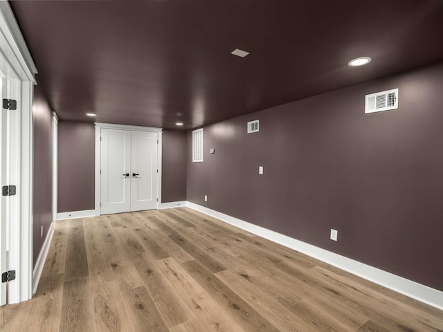 1015 Jump Off Rd, Bon Aqua, TN 37025 - basement with light wood-style flooring and recessed lighting