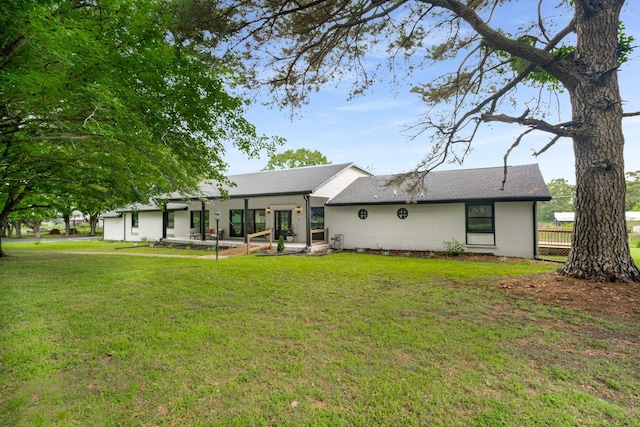 1015 Jump Off Rd, Bon Aqua, TN 37025 - view of front of home featuring brick siding and a shingled roof