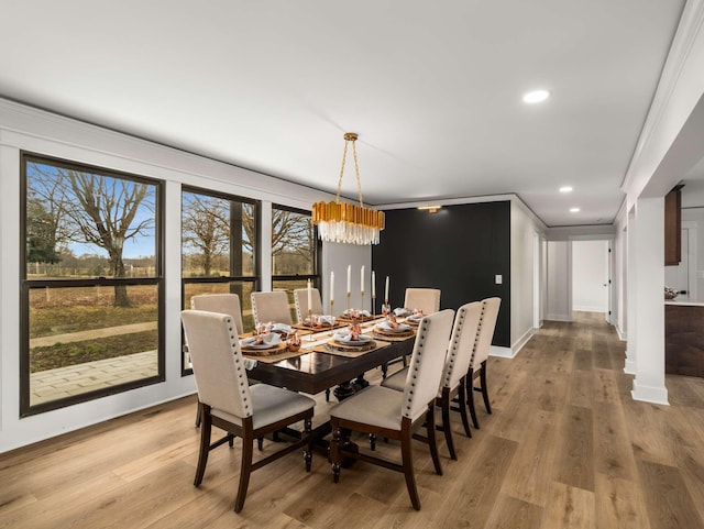 1015 Jump Off Rd, Bon Aqua, TN 37025 - dining area featuring a chandelier, recessed lighting, ornamental molding, and wood finished floors