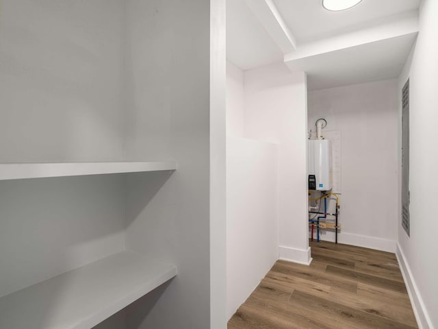 1015 Jump Off Rd, Bon Aqua, TN 37025 - corridor featuring water heater and wood finished floors
