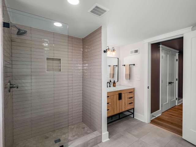 1015 Jump Off Rd, Bon Aqua, TN 37025 - full bathroom featuring vanity, a shower stall, recessed lighting, and tile patterned floors