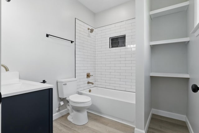 217 Dunnaway St, Shelbyville, TN 37160 - bathroom with wood finished floors, vanity, and shower / bathtub combination