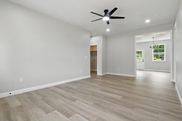 217 Dunnaway St, Shelbyville, TN 37160 - spare room with ceiling fan, light wood-type flooring, recessed lighting, and a chandelier