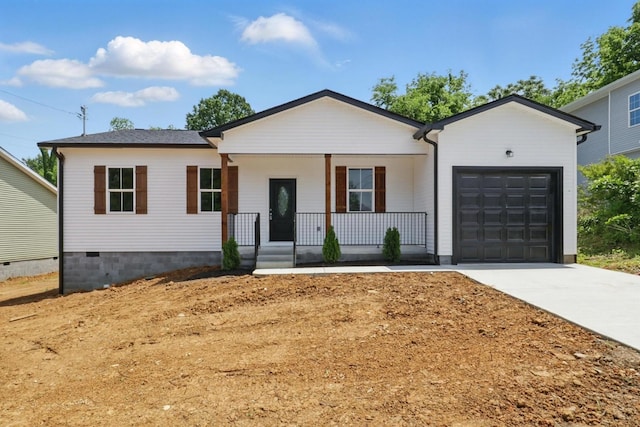219 Dunnaway St, Shelbyville, TN 37160 - view of front facade with a porch, an attached garage, driveway, and crawl space