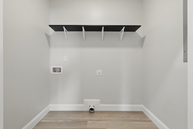 219 Dunnaway St, Shelbyville, TN 37160 - washroom with washer hookup, light wood-style floors, and hookup for an electric dryer