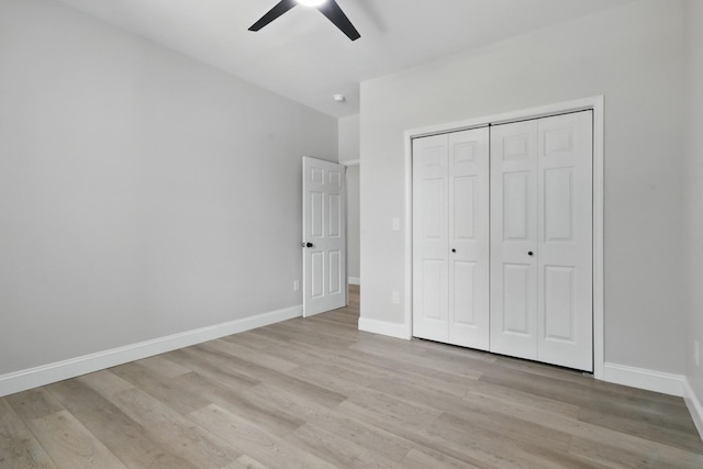 219 Dunnaway St, Shelbyville, TN 37160 - unfurnished bedroom featuring light wood-style flooring, a closet, and ceiling fan