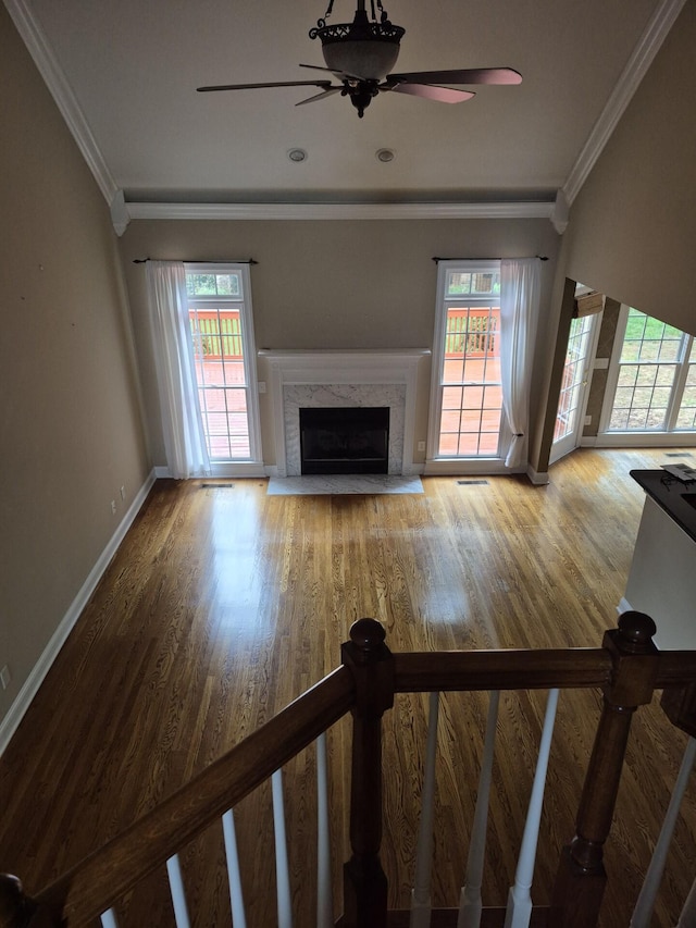 915 Joel Cheek Blvd, Franklin, TN 37064 - living room with crown molding, a premium fireplace, wood finished floors, and ceiling fan