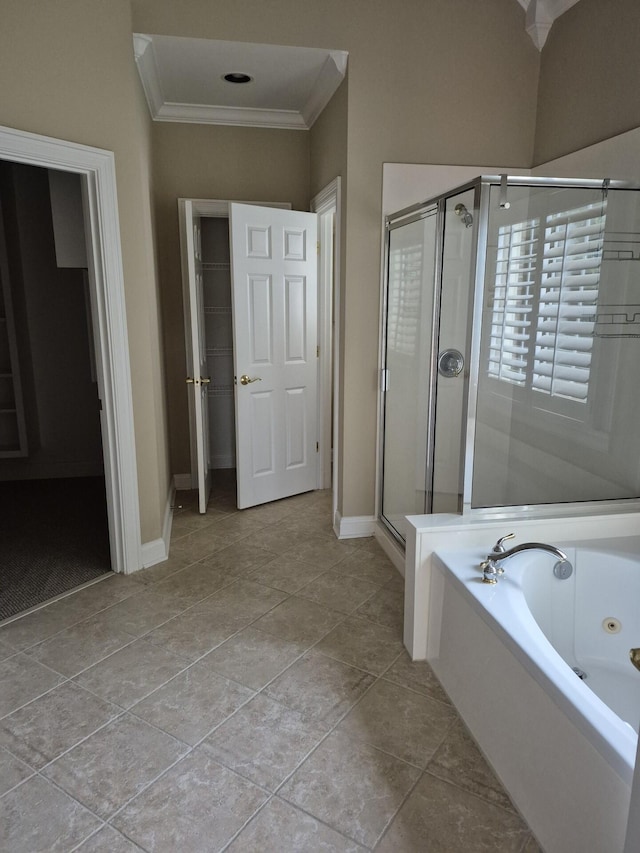 915 Joel Cheek Blvd, Franklin, TN 37064 - bathroom featuring a stall shower, a tub with jets, crown molding, and tile patterned floors