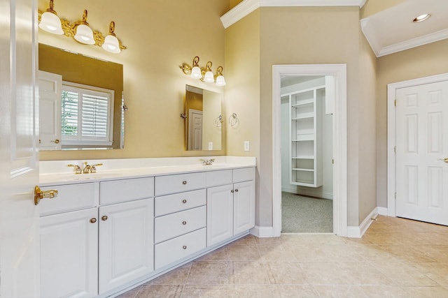 915 Joel Cheek Blvd, Franklin, TN 37064 - full bathroom featuring double vanity, crown molding, tile patterned floors, and a walk in closet