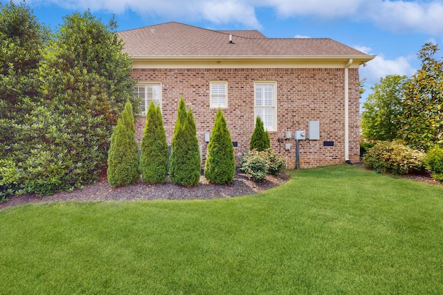 915 Joel Cheek Blvd, Franklin, TN 37064 - view of property exterior with a yard, brick siding, and roof with shingles