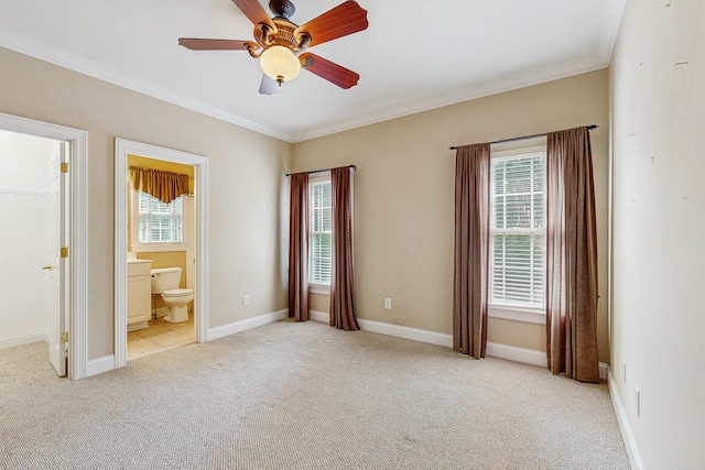 915 Joel Cheek Blvd, Franklin, TN 37064 - unfurnished bedroom with light carpet, multiple windows, ornamental molding, ensuite bath, and ceiling fan