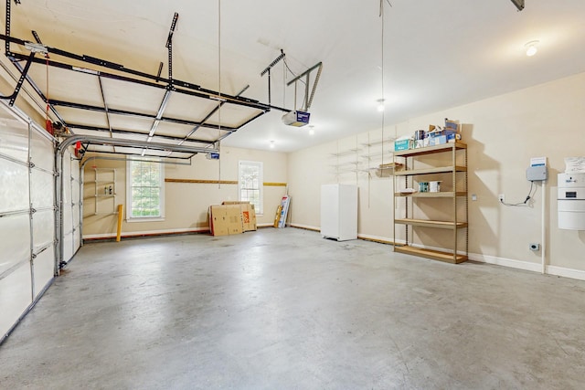 915 Joel Cheek Blvd, Franklin, TN 37064 - garage with a garage door opener and baseboards