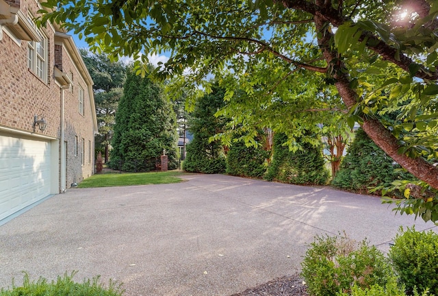 915 Joel Cheek Blvd, Franklin, TN 37064 - view of patio / terrace with a garage and driveway