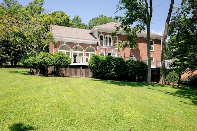 159 N Berwick Ln, Franklin, TN 37069 - rear view of house with brick siding, a yard, and a balcony