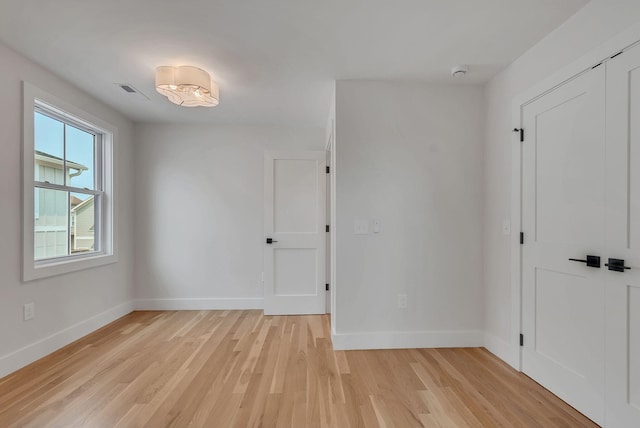 300 Natchez St, Franklin, TN 37064 - empty room featuring light wood-style flooring and a smoke detector
