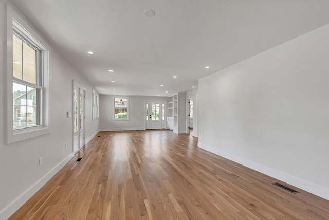 300 Natchez St, Franklin, TN 37064 - unfurnished living room with light wood-style floors and recessed lighting
