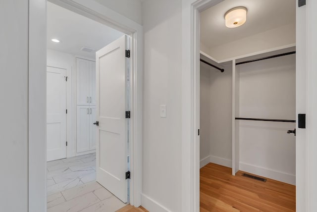 300 Natchez St, Franklin, TN 37064 - corridor featuring light marble finish flooring and recessed lighting