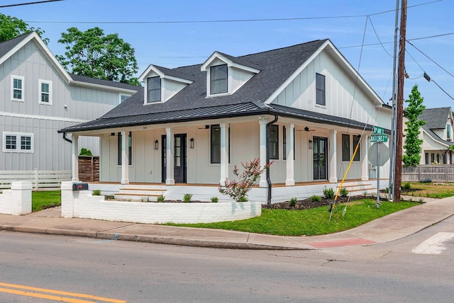 300 Natchez St, Franklin, TN 37064 - modern inspired farmhouse with a standing seam roof, a porch, a metal roof, and board and batten siding
