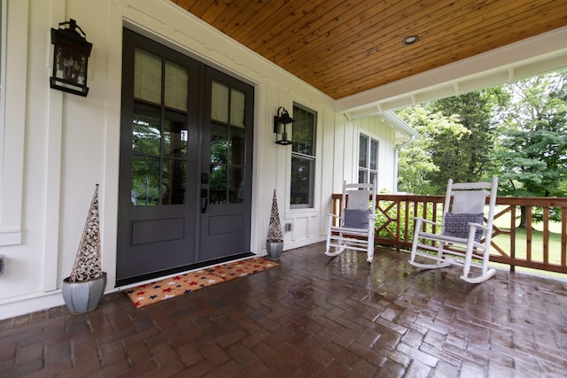 4150 Knipfer Rd, Joelton, TN 37080 - view of exterior entry featuring board and batten siding and covered porch
