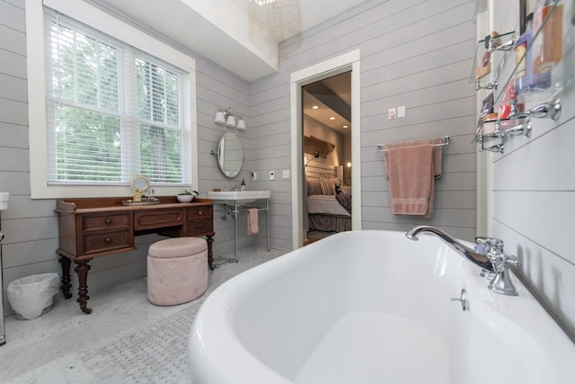 4150 Knipfer Rd, Joelton, TN 37080 - bathroom with a soaking tub, ensuite bath, and wooden walls