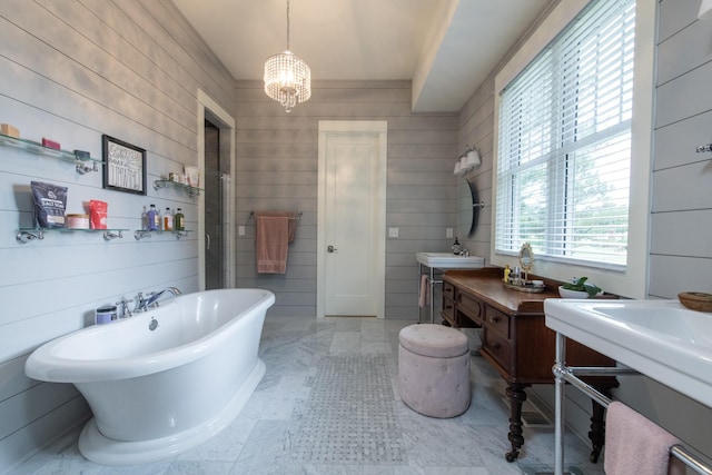 4150 Knipfer Rd, Joelton, TN 37080 - full bath featuring a freestanding bath and a chandelier
