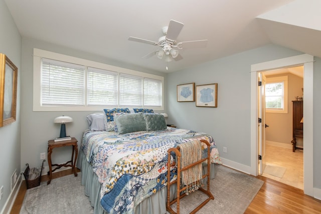 4150 Knipfer Rd, Joelton, TN 37080 - bedroom with light wood-type flooring, multiple windows, and a ceiling fan