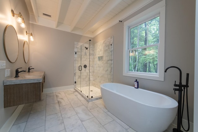 4150 Knipfer Rd, Joelton, TN 37080 - full bathroom featuring a soaking tub, a shower stall, double vanity, marble finish flooring, and beamed ceiling