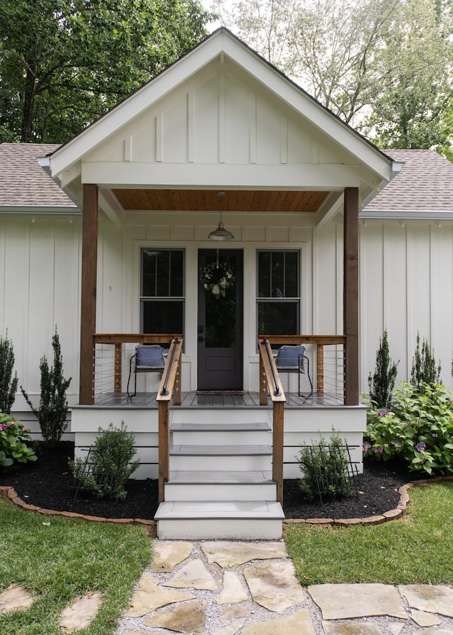 4150 Knipfer Rd, Joelton, TN 37080 - view of front facade featuring board and batten siding, roof with shingles, and a porch