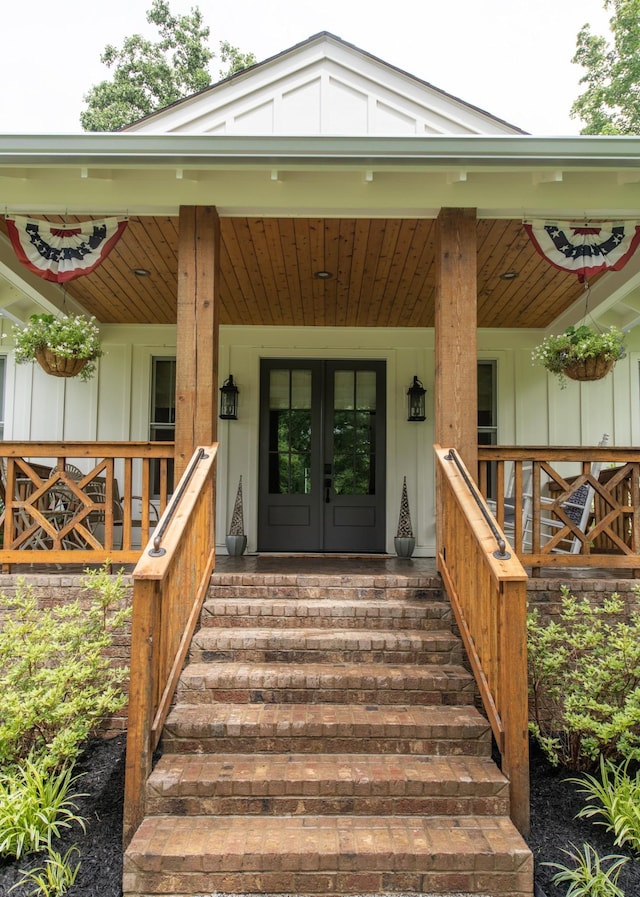 4150 Knipfer Rd, Joelton, TN 37080 - property entrance featuring a porch, board and batten siding, and french doors