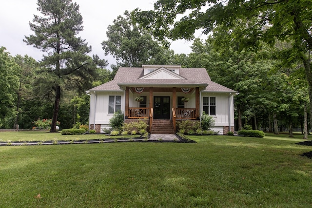 4150 Knipfer Rd, Joelton, TN 37080 - bungalow-style house with covered porch, board and batten siding, and a front lawn