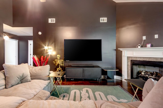 1029 Charles Thomas Dr, Clarksville, TN 37042 - living area featuring wood finished floors, a fireplace, and a towering ceiling