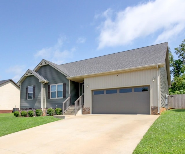 1029 Charles Thomas Dr, Clarksville, TN 37042 - view of front of property featuring a garage, concrete driveway, and crawl space